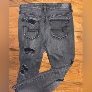 American Eagle, size 10, black skinny jeans with rips